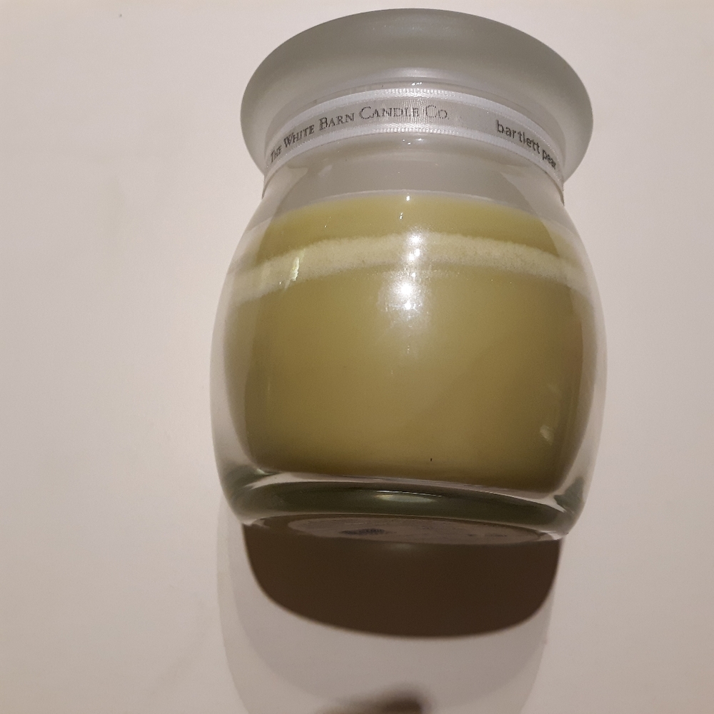 Used White Barn Candle Bartlett Pear 7.5 oz jar candle about 75% full